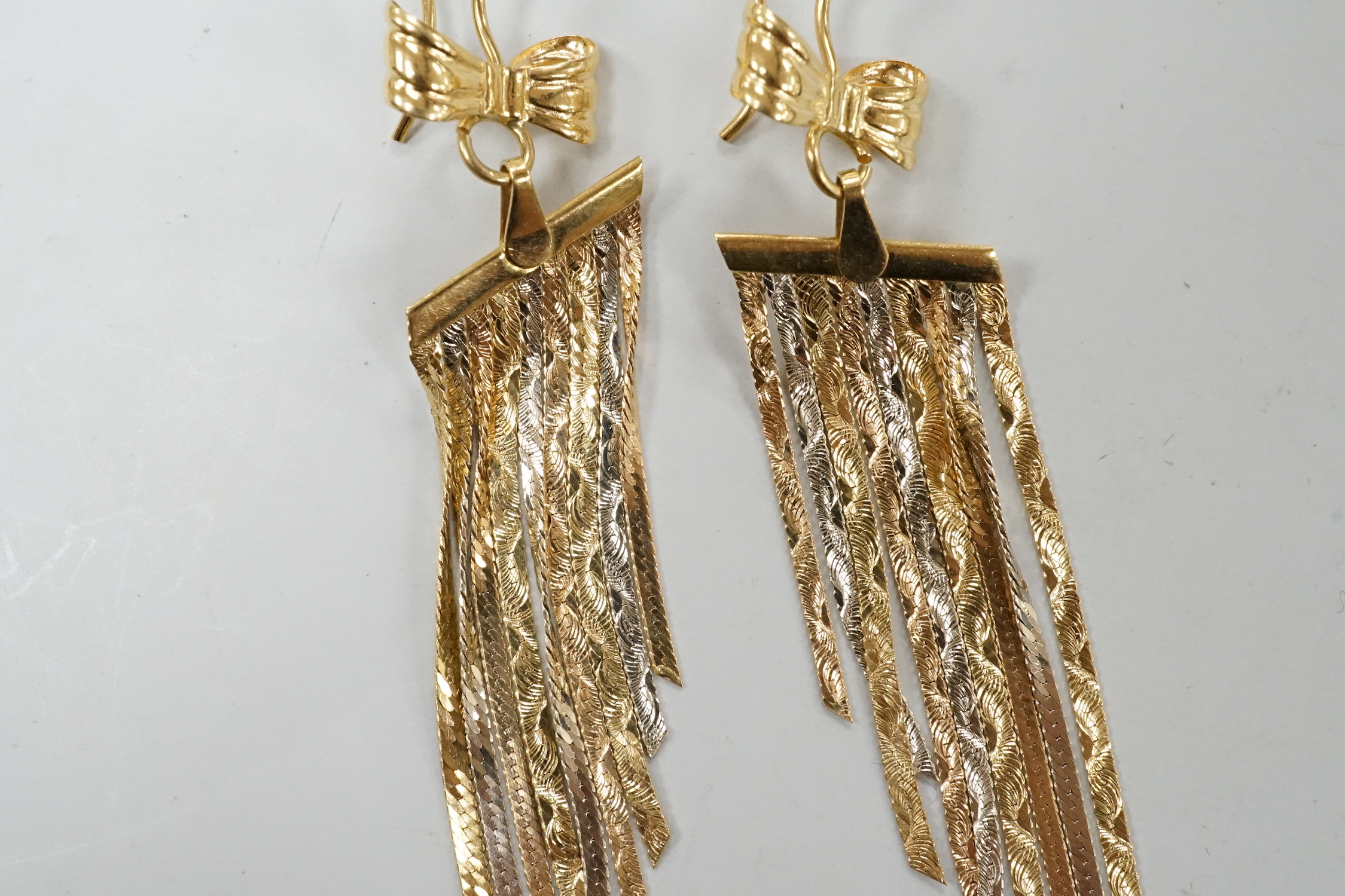 A modern pair of three colour 750 graduated tassel drop earrings, overall 95mm, 8.7 grams.